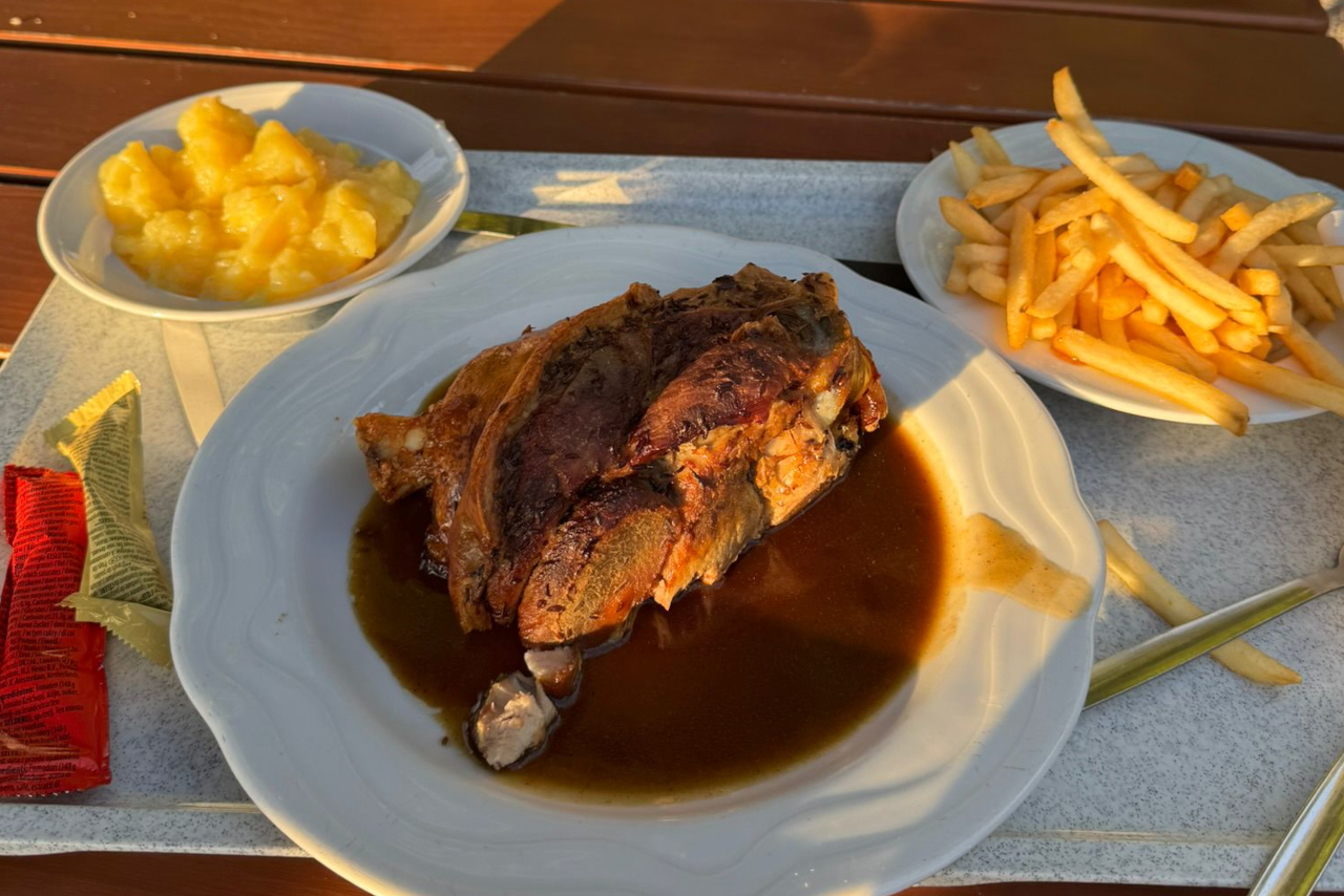 Traditional Bavarian dish — Schweinshaxe with Knödel and sauerkraut